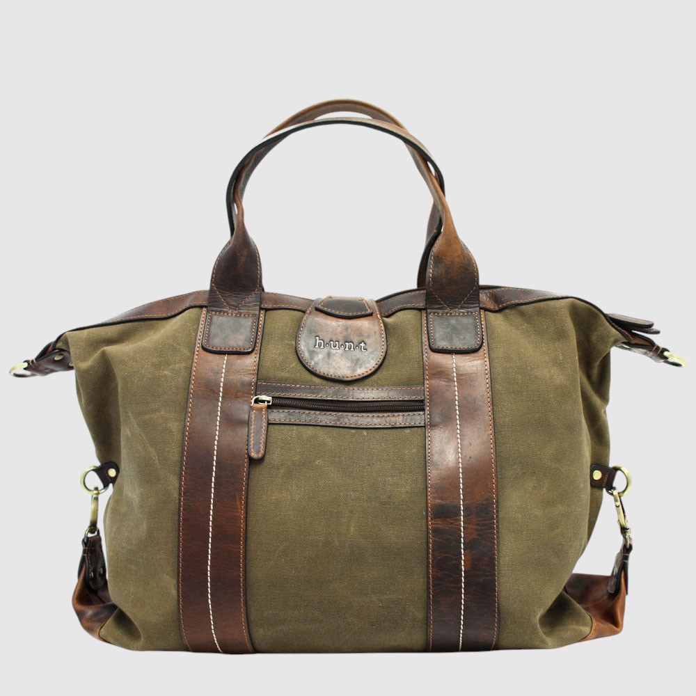 Sac de voyage en cuir et canevas – H.U.N.T