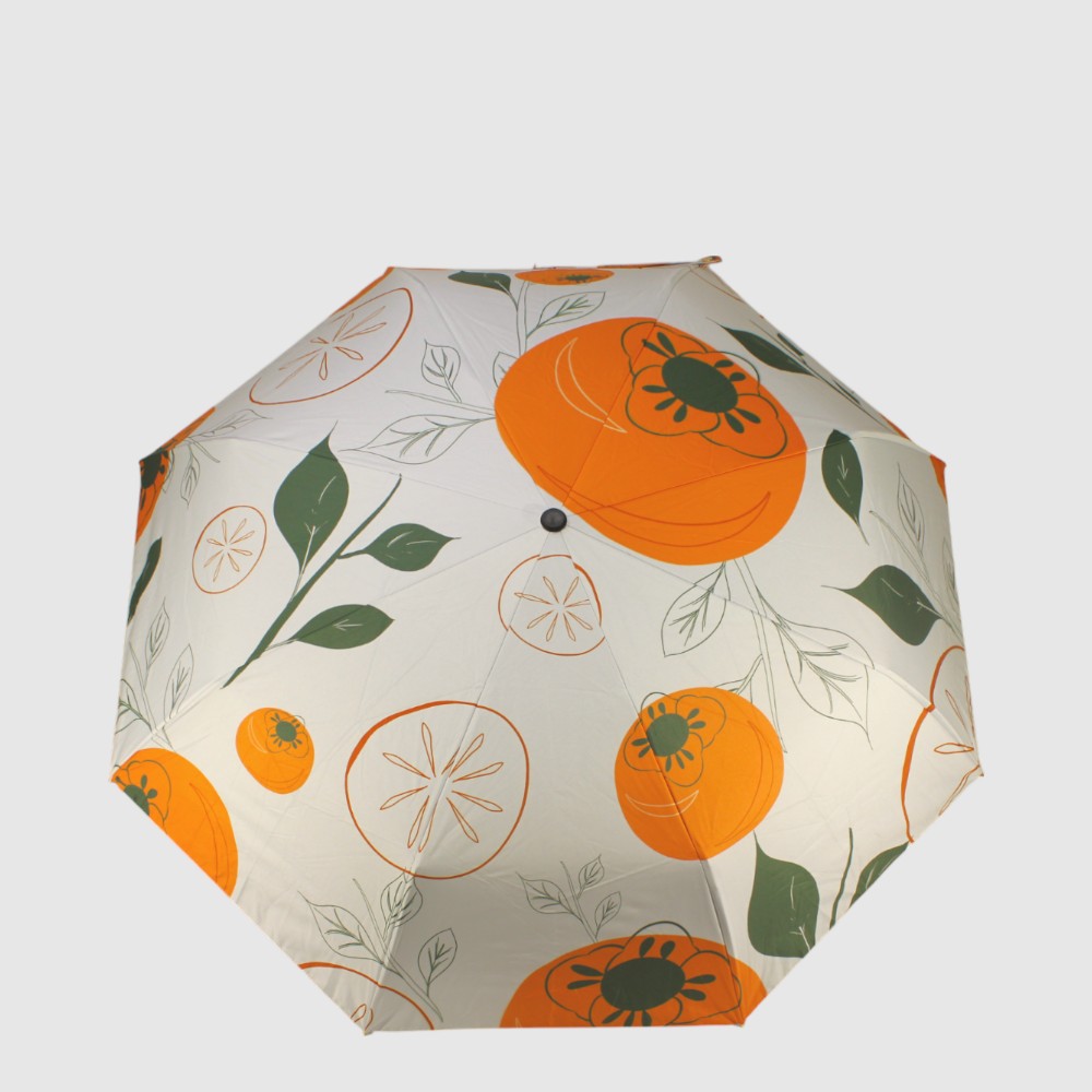 Short umbrella with summery patterns and a gold interior – MATTE